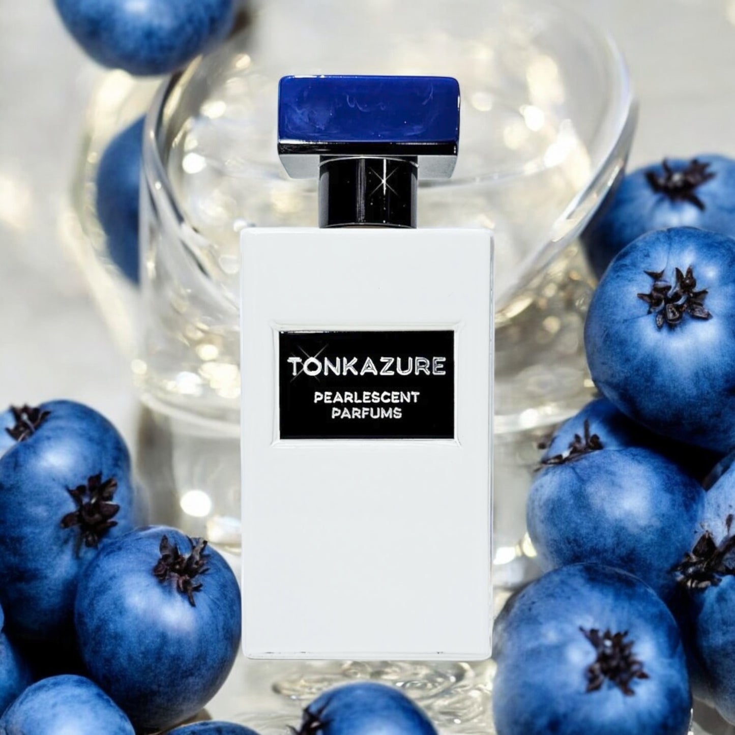 Close-up of a perfume sample of TONKAZURE, showcasing its vibrant blend of fresh fruit, soft florals, and warm amber-musk for a versatile and luxurious scent.